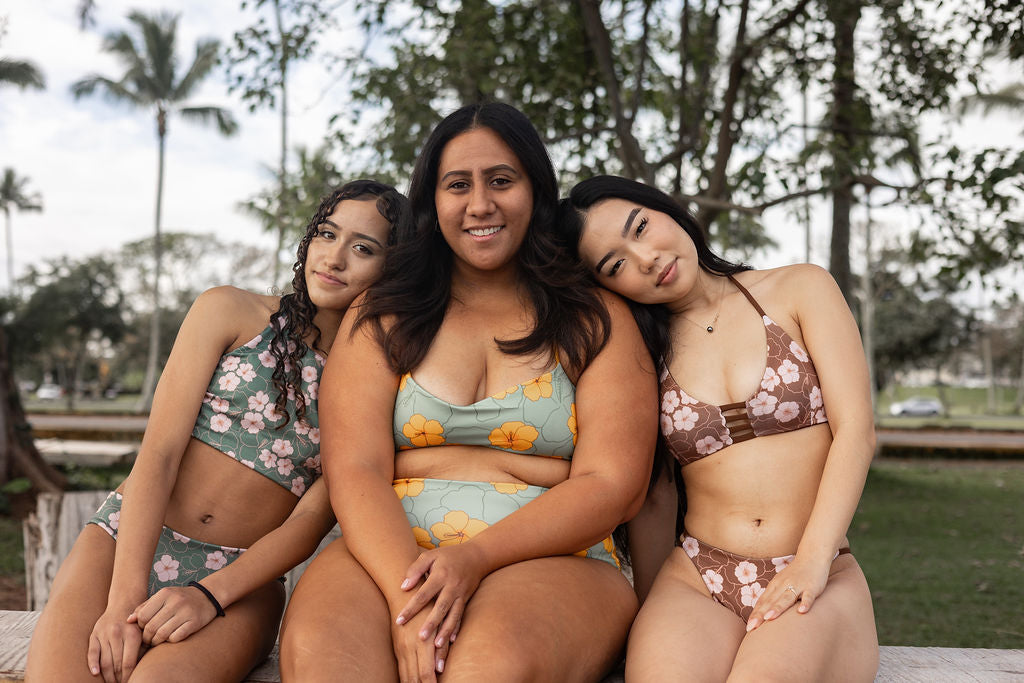 Three young ladies in custom-sized swimwear